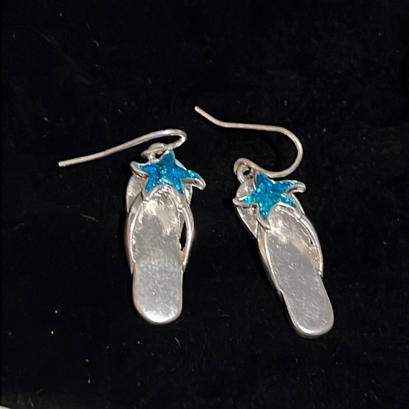 Jewelry - Beautiful, silvertone, flip-flop earrings with blue stars